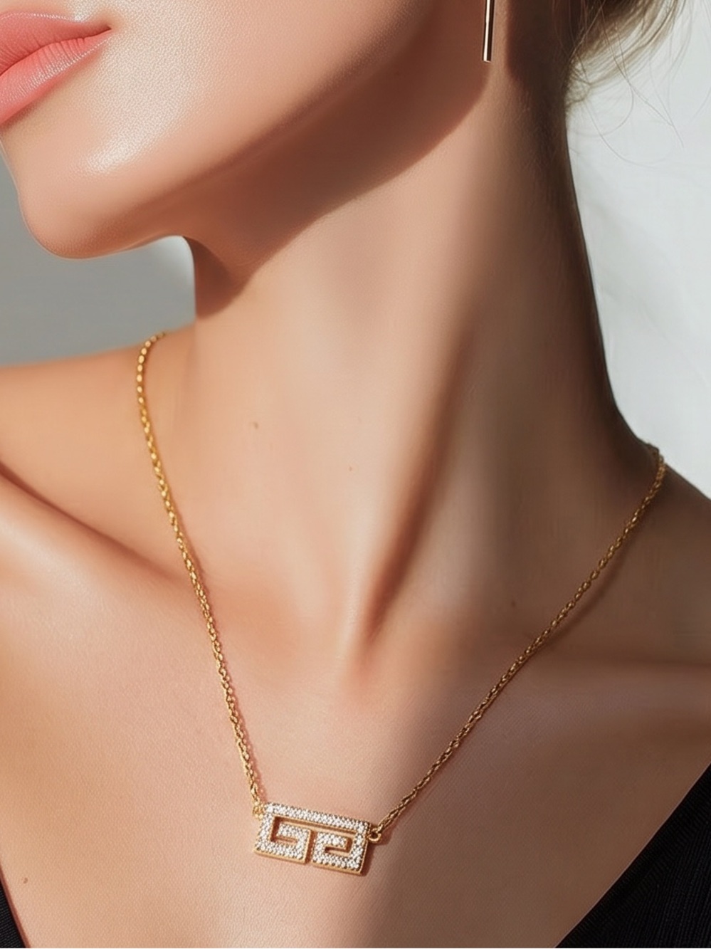 Givenchy Gold-Tone Interlocking G Rhinestone Pendant Necklace